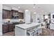 Modern kitchen with dark cabinets, white countertops, and a kitchen island at 47 Rosedale Way, Pittsboro, NC 27312
