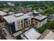 Aerial view showcasing apartment building and surrounding neighborhood at 523 S West St # 402, Raleigh, NC 27601