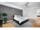 Bedroom with gray accent wall and built-in storage at 523 S West St # 402, Raleigh, NC 27601