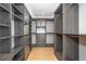 Large walk-in closet with ample shelving and hanging space at 523 S West St # 402, Raleigh, NC 27601