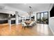 Open dining room with live-edge table and modern chairs at 523 S West St # 402, Raleigh, NC 27601