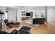 Bright living room with hardwood floors, fireplace, and comfortable seating at 523 S West St # 402, Raleigh, NC 27601
