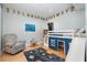 bedroom with bunk bed, alphabet wall, and play area at 523 S West St # 402, Raleigh, NC 27601