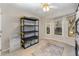 Bright bedroom with a window seat, ceiling fan, and ample storage at 5412 Sandy Trail Dr, Knightdale, NC 27545