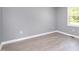 Simple bedroom with new flooring and neutral walls at 722 Martin St, Durham, NC 27704