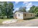 Tan house with a small yard and gravel driveway at 722 Martin St, Durham, NC 27704