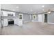 Open concept kitchen with white cabinets and stainless steel appliances at 722 Martin St, Durham, NC 27704
