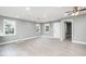 Bright and spacious living room with gray walls and wood-look floors at 722 Martin St, Durham, NC 27704