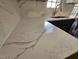 Close-up of the kitchen's luxurious quartz countertop at 104 Annotto Bay Ln, Garner, NC 27529