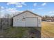 Detached garage with roll-up door needing some repairs at 1261 N Nc 49, Burlington, NC 27217