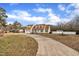 House exterior showcasing a two-car garage and a ramp at 1516 Pearces Rd, Zebulon, NC 27597