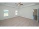 Spacious bedroom with carpeted floor and ceiling fan at 17 E Victory View Ter, Smithfield, NC 27577