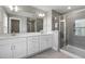 Elegant bathroom with double vanity, shower, and modern design at 1803 Ballard Rd # Holly Craftsman, Fuquay Varina, NC 27526