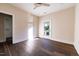 Bright bedroom with hardwood floors and private balcony at 2407 Hart St # A, Durham, NC 27703