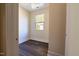 Small bedroom with hardwood floors and a window at 2407 Hart St # A, Durham, NC 27703
