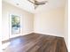 Charming bedroom with a door leading to the outdoors at 2407 Hart St # A, Durham, NC 27703