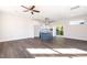 Open concept kitchen with island and hardwood floors at 2407 Hart St # A, Durham, NC 27703