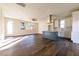Open concept kitchen with island and stainless steel appliances at 2407 Hart St # A, Durham, NC 27703