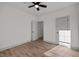 Bright bedroom with ceiling fan and hardwood floors at 2722 Maple Ave, Burlington, NC 27215