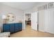 A hallway with blue cabinet and view into dining area at 413 Faith Dr, Gibsonville, NC 27249