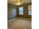 Bright bedroom with carpet and ceiling fan at 4904 Arbor Chase Dr, Raleigh, NC 27616