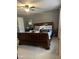 Bedroom with king-size bed and ceiling fan at 4904 Arbor Chase Dr, Raleigh, NC 27616