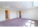 Main bedroom with carpet and access to bathroom at 6100 Sunset Lake Road Rd, Fuquay Varina, NC 27526