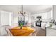 Open dining area with a view of the living room and kitchen at 835 Graham St, Burlington, NC 27217