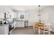 Modern kitchen with white cabinets, granite counters, and stainless steel appliances at 835 Graham St, Burlington, NC 27217