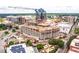 Aerial view of a modern building under construction in a city setting at 400 W Main St # 2503, Durham, NC 27701