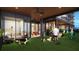 Rooftop dog park with artificial turf and seating for pet owners at 400 W Main St # 2403, Durham, NC 27701