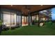 Outdoor pet park with artificial turf and agility equipment at 400 W Main St # 2303, Durham, NC 27701