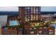 Rooftop pool and lounge area with city views at 400 W Main St # 2402, Durham, NC 27701