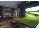 State-of-the-art golf simulator room at 400 W Main St # 2402, Durham, NC 27701