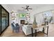 Living room features hardwood floors, fireplace and built-in shelving at 8917 Grand Highland Way, Wake Forest, NC 27587