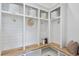 Functional mudroom with built-in bench and storage at 8917 Grand Highland Way, Wake Forest, NC 27587