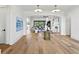 Bright entry with hardwood floors and views into the living room at 8917 Grand Highland Way, Wake Forest, NC 27587