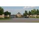Gated community entrance with landscaping at 8917 Grand Highland Way, Wake Forest, NC 27587