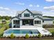Stunning home, pool, and outdoor entertaining area at 8917 Grand Highland Way, Wake Forest, NC 27587