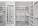 Large walk-in closet with ample shelving and hanging space at 8917 Grand Highland Way, Wake Forest, NC 27587