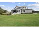 Beautiful home with expansive lawn and landscaping at 8917 Grand Highland Way, Wake Forest, NC 27587