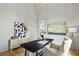 Spacious home office featuring hardwood floors and stylish decor at 8917 Grand Highland Way, Wake Forest, NC 27587