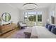 Spacious main bedroom with large windows and sitting area at 8917 Grand Highland Way, Wake Forest, NC 27587