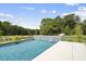 Relaxing pool with waterfall feature at 8917 Grand Highland Way, Wake Forest, NC 27587