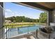 Stunning pool with a spa and serene backyard view from covered patio at 8917 Grand Highland Way, Wake Forest, NC 27587