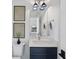 Clean bathroom with a modern vanity and framed mirror at 8917 Grand Highland Way, Wake Forest, NC 27587