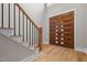 Elegant entryway with hardwood floors and a grand staircase at 20 Carnation Rd, Youngsville, NC 27596