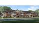 Brick building exterior with several units and landscaping at 621 Weather Ridge Ln # 33, Cary, NC 27513