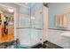 Elegant bathroom with a large walk-in shower and marble floors at 321 Villa Dr, Durham, NC 27712