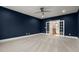 Spacious bonus room with carpeted floor and ceiling fan at 10 Carnation Rd, Youngsville, NC 27596
